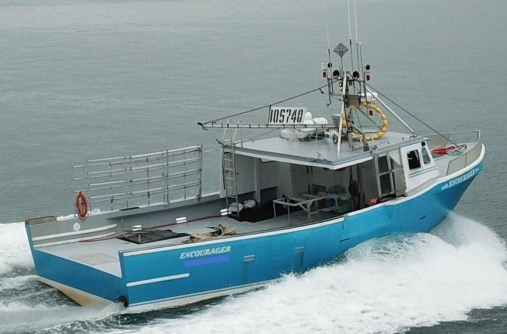 blue fishing boat with equipment and registration number sailing on calm water